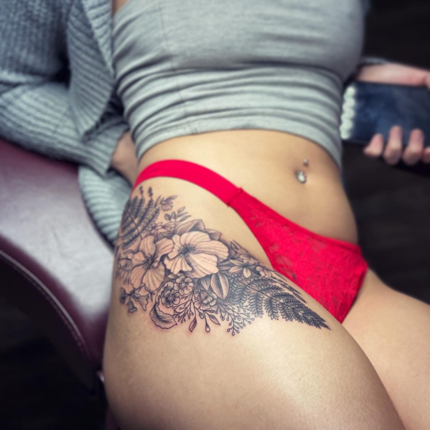 Floral hip tattoo