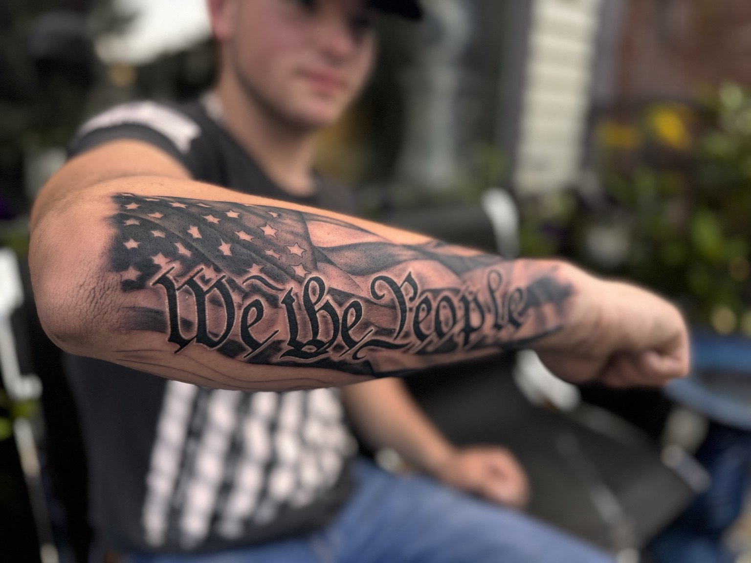 We the People black and gray tattoo
